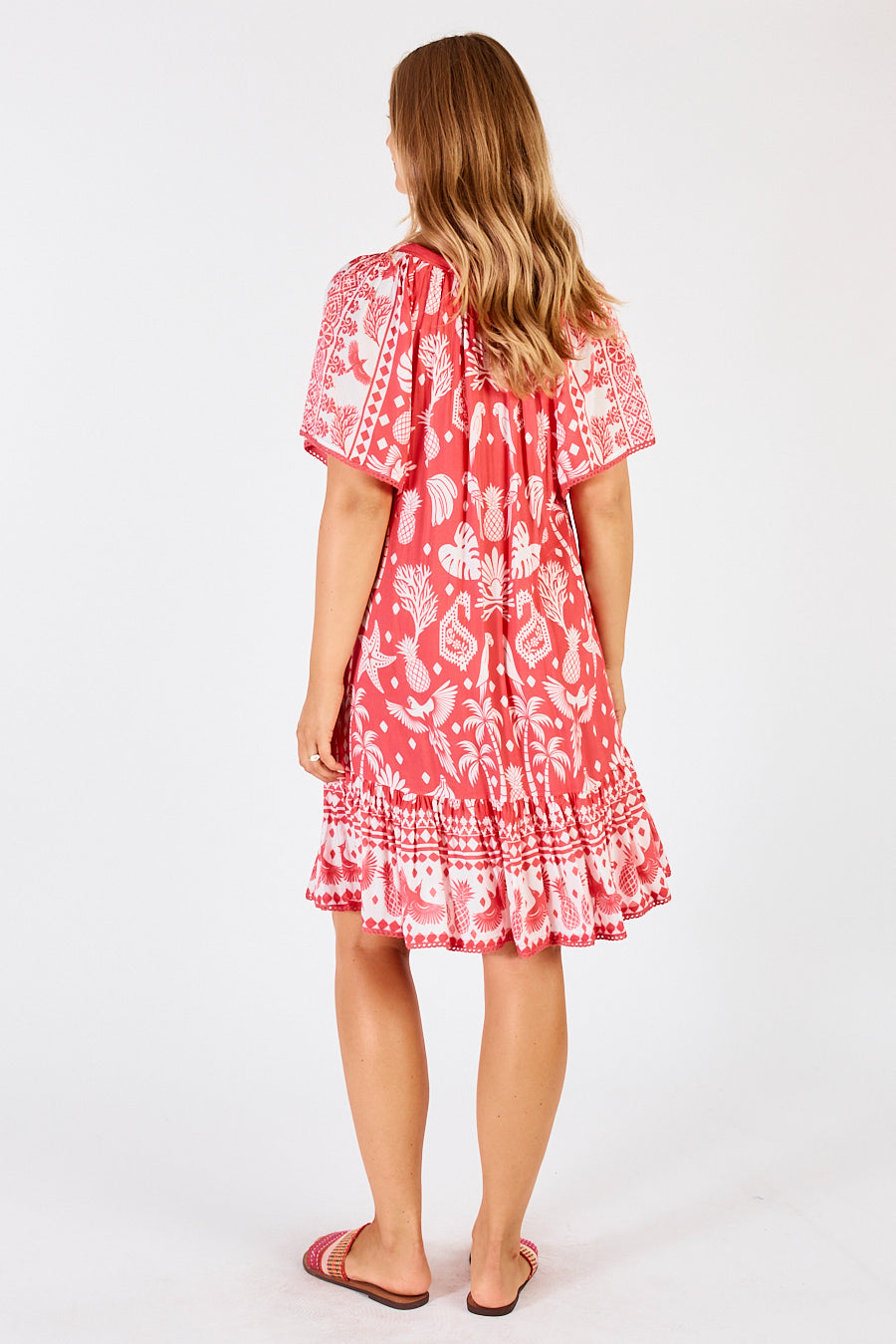 Back of Agatha Midi Shirred Dress in red and white bird tropical print by LulaLife.