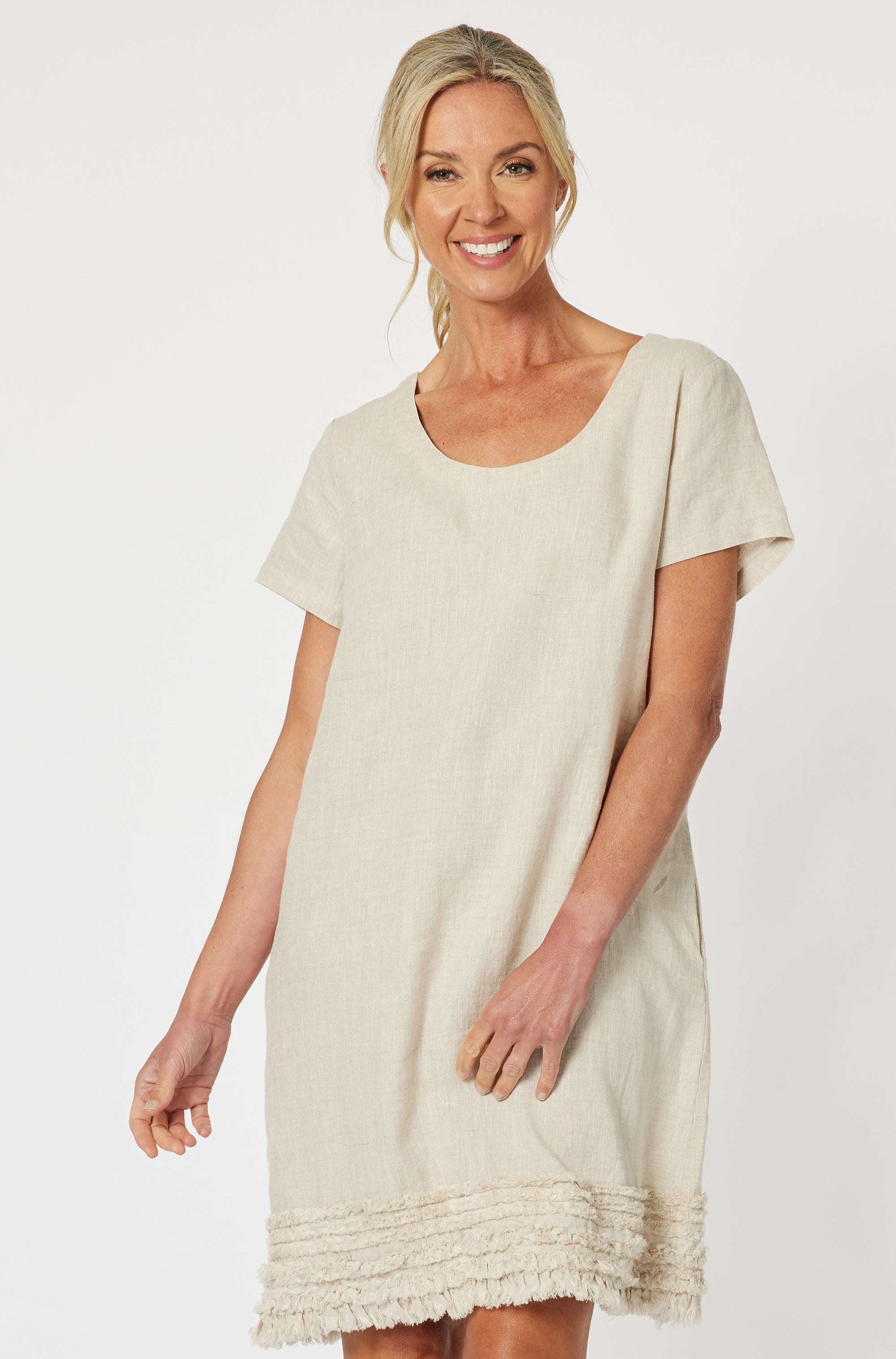 Ladies Natural / Beige linen dress with ruffles along the hem, short sleeves and round neck.