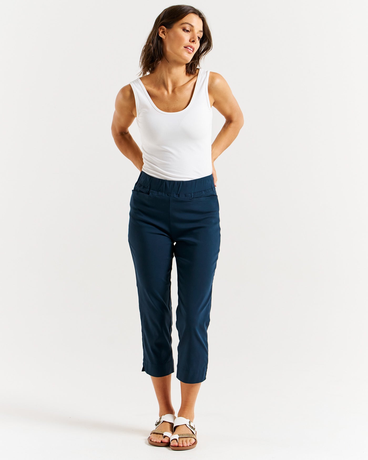 Model wearing Navy Blue Crop Bengaline Pants by Betty Basics.