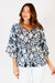 LulaLife Mia Top in Navy Blue and White swirl and floral print with v-neck and long ruffle sleeves.