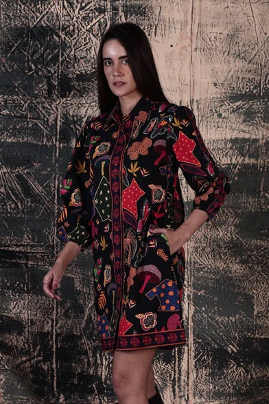 Maude Vivante's A-line Ava Midi Shirt Dress in Night Glow a black base with a bright fun print.