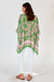 Back of Carara kaftan shirt in pink and green leaf print with a pointed side hems.