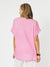 Back of champagne vneck short sleeve t-shirt top in Paradise Pink by Hammock & Vine.