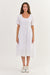 White Baby Doll Style Midi Dress with Piping under the bust in an arc by Namastai.