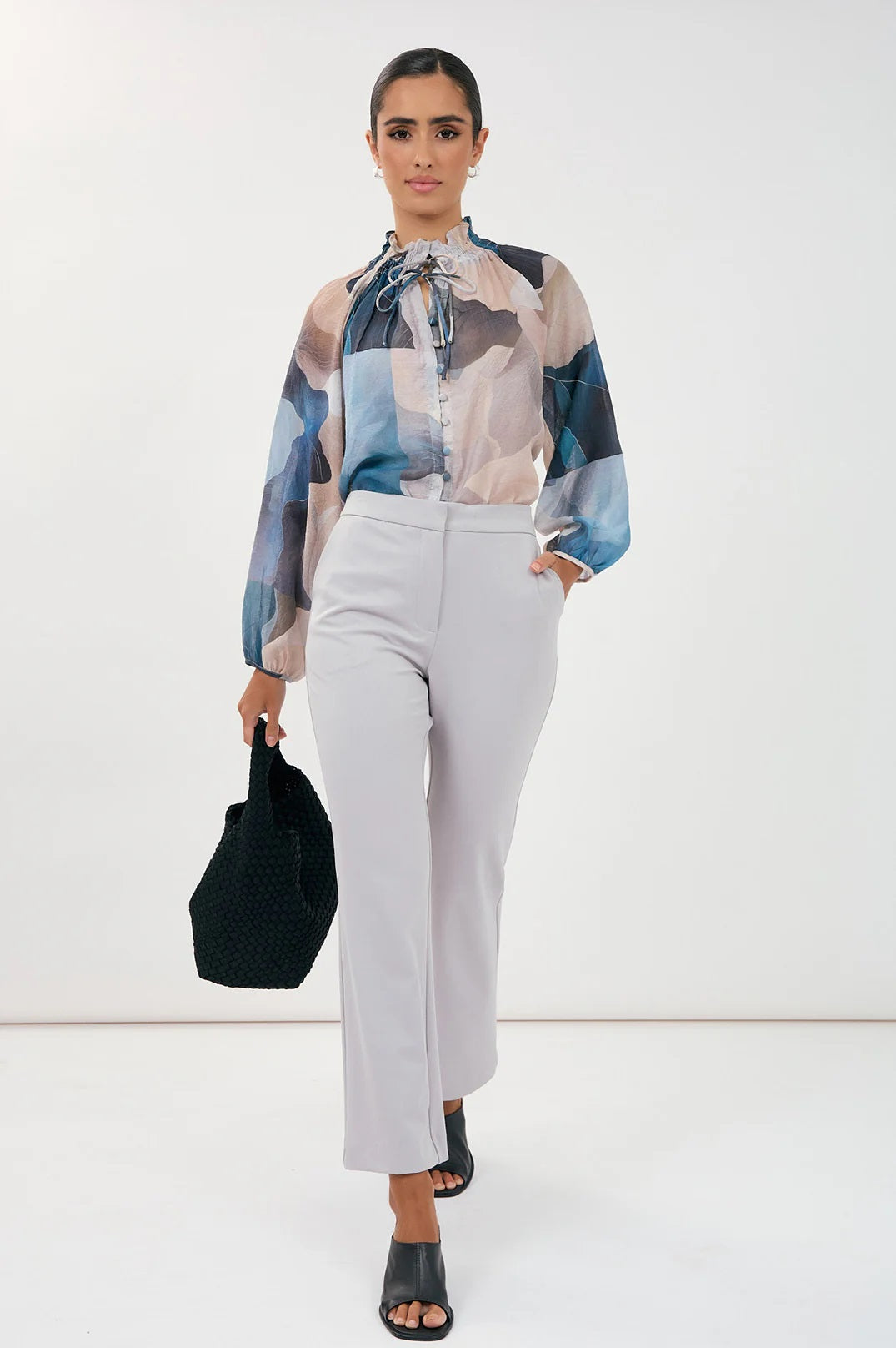 Gathered Neckline with Ties, long sleeves with elasticated cuffs and a gorgeous blue, cream and grey print by Adorne.