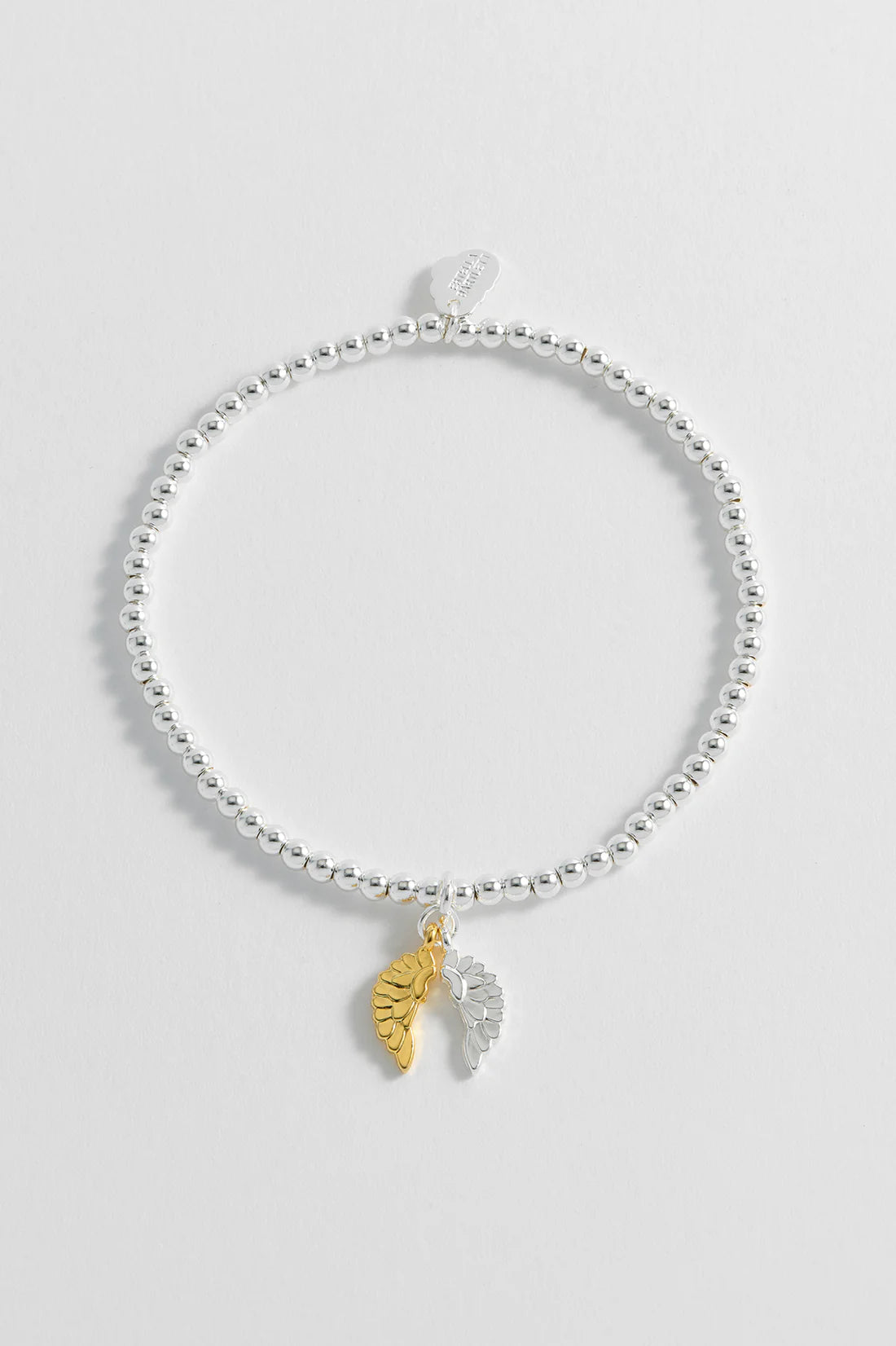 Estella Bartlett Wings Pendant Friendship Bracelet, with beads and stretch elastic in Silver Plating.