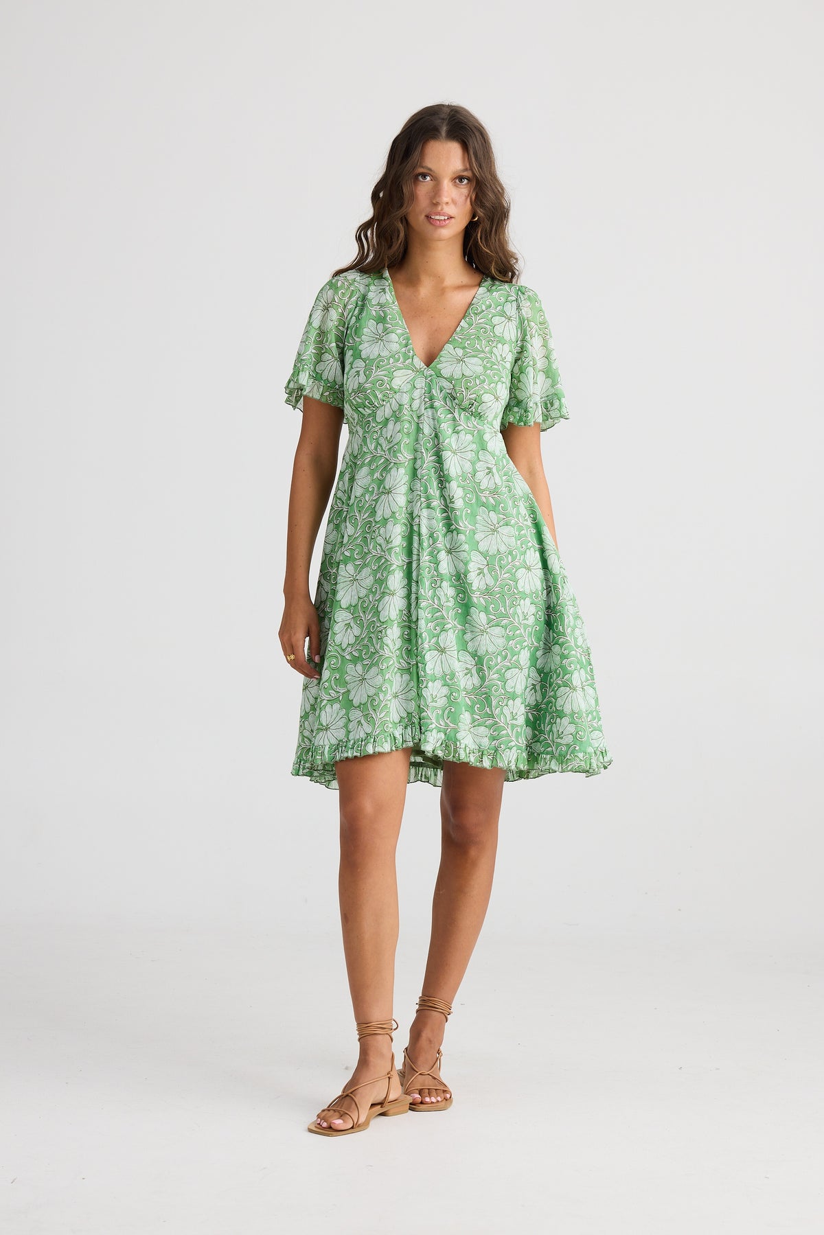 Talisman Tea Party Dress in Apple Blossom a Green and White floral print.