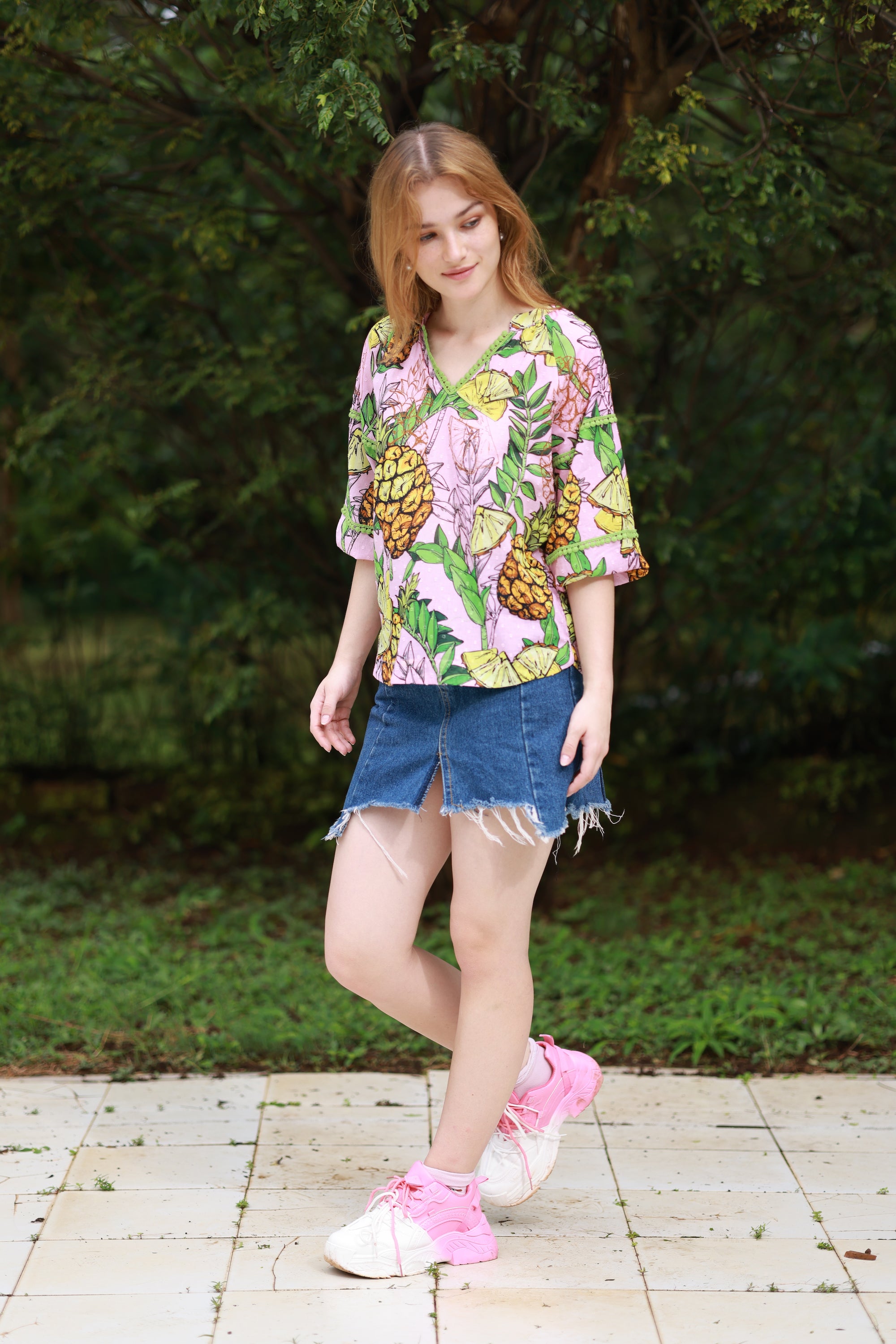 Trixie Top with pineapple print, elbow length sleeves and v-neck.