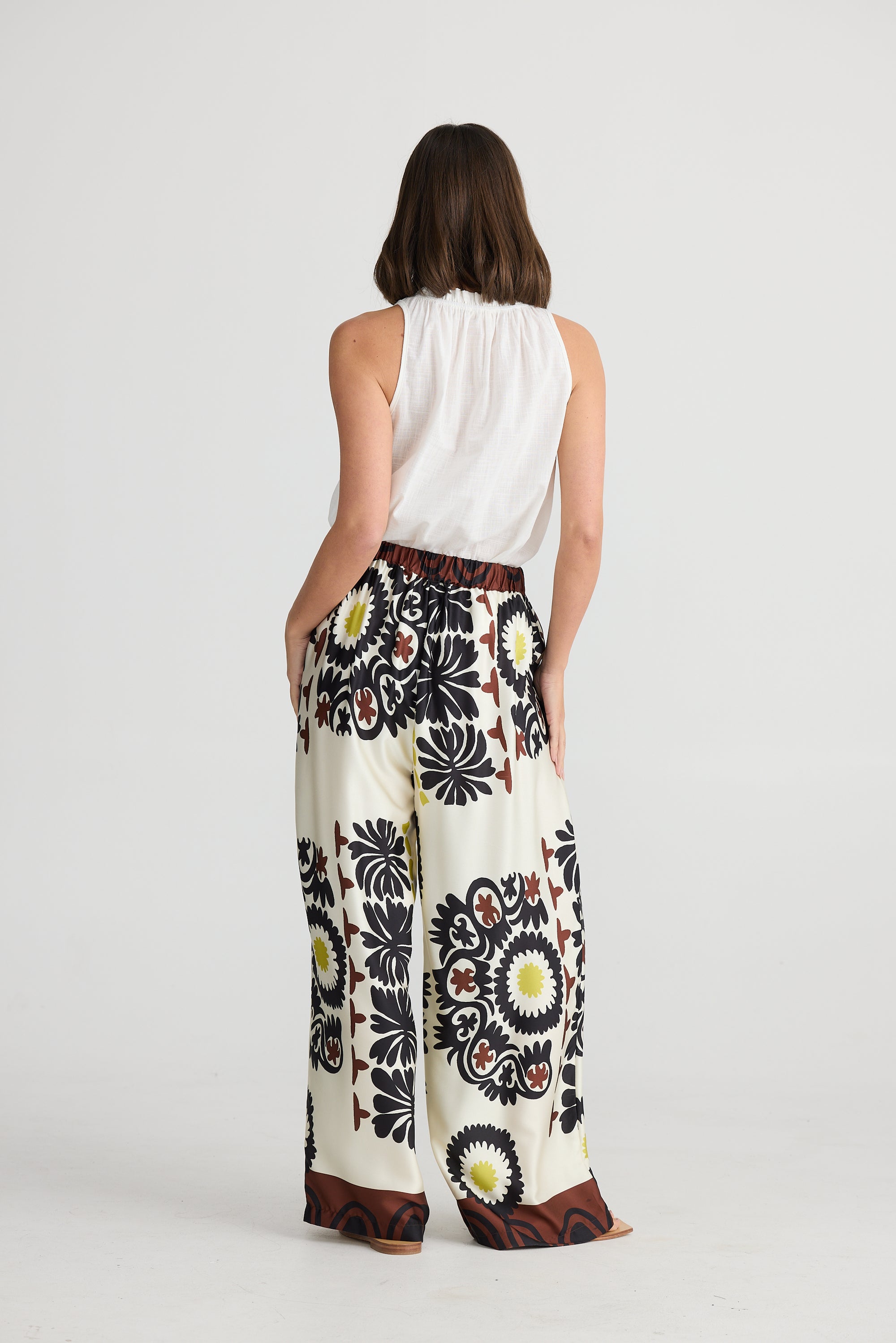 Back of women's playa full length pants with elasticated waist and pockets in Island Time by Holiday.