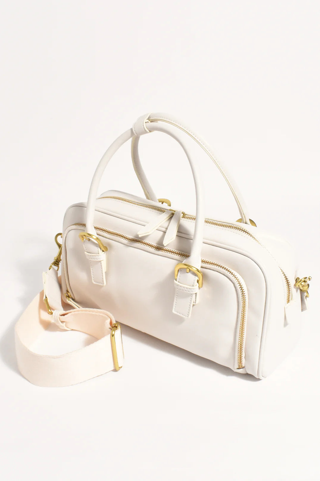 Ottilie Bowler Handbag in Cream with handles and cross body strap.