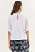 Back of White Crinkle cotton top with Key hole opening with a button by Namastai.